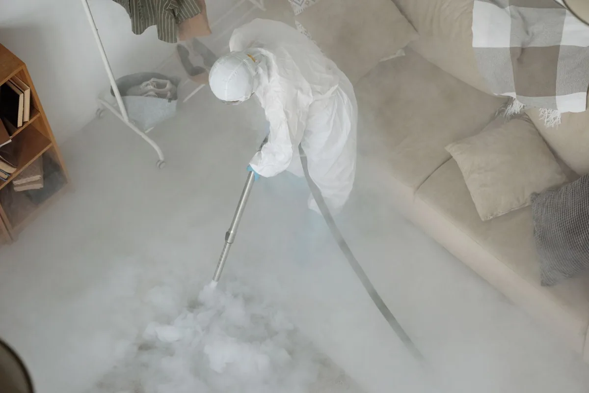 Biohazard cleanup technician in protective equipment, Phoenixville, PA